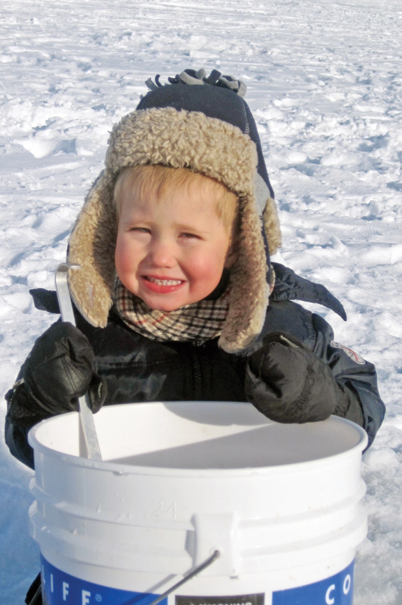 Ice fishing little boy