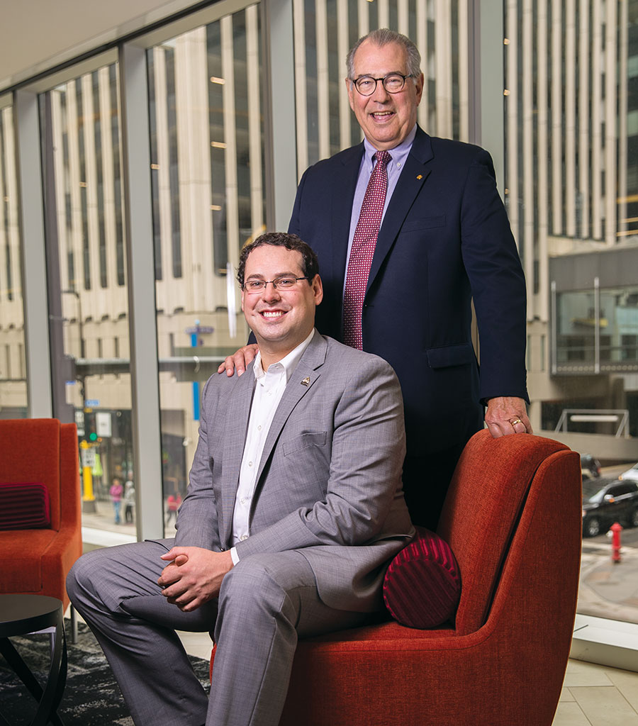 A portrait of Matt Freeman with his father, Mike.