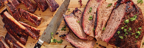 Ribs from Rudolph's on a cutting board, part of the best barbecue in Minnesota.