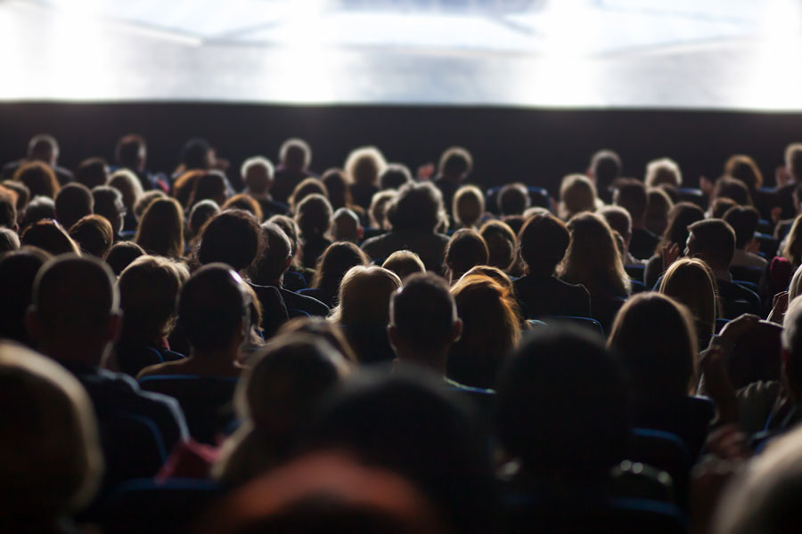 Audience members watching a movie at the Twin Cities Film Fest.