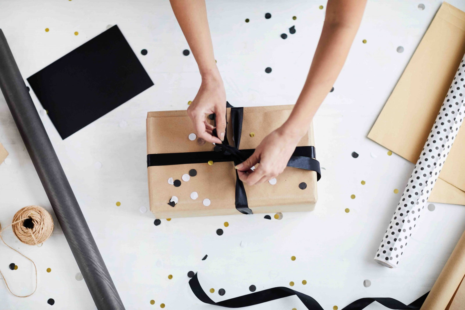 An above shot of gold, black, and white gift wrapping. Photo courtesy pressmaster/Fotolia.