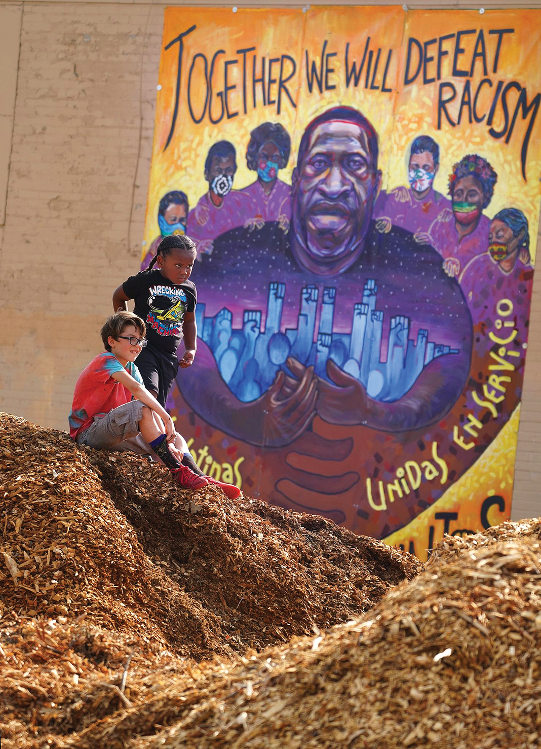 Kids attend the opening of the South Minneapolis Youth Garden at Lake Street and Chicago Avenue, launched by The Real Minneapolis