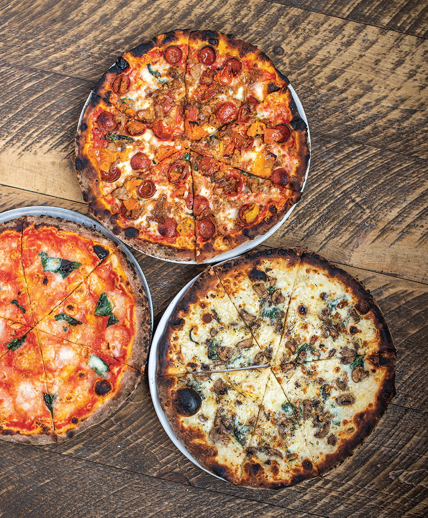 Clockwise, from left: The No. 11 Margarita, No. 12 Tono, and No. 16 Fungo pizzas