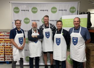 From left to right: Pete Kostroski/Taste Fore the Tour; Andrew Zimmern; Kyle Rudolph; Joe McDonald/CEO of VEAP; Dan Fagen/Pres & CEO of Tradition Capital Bank