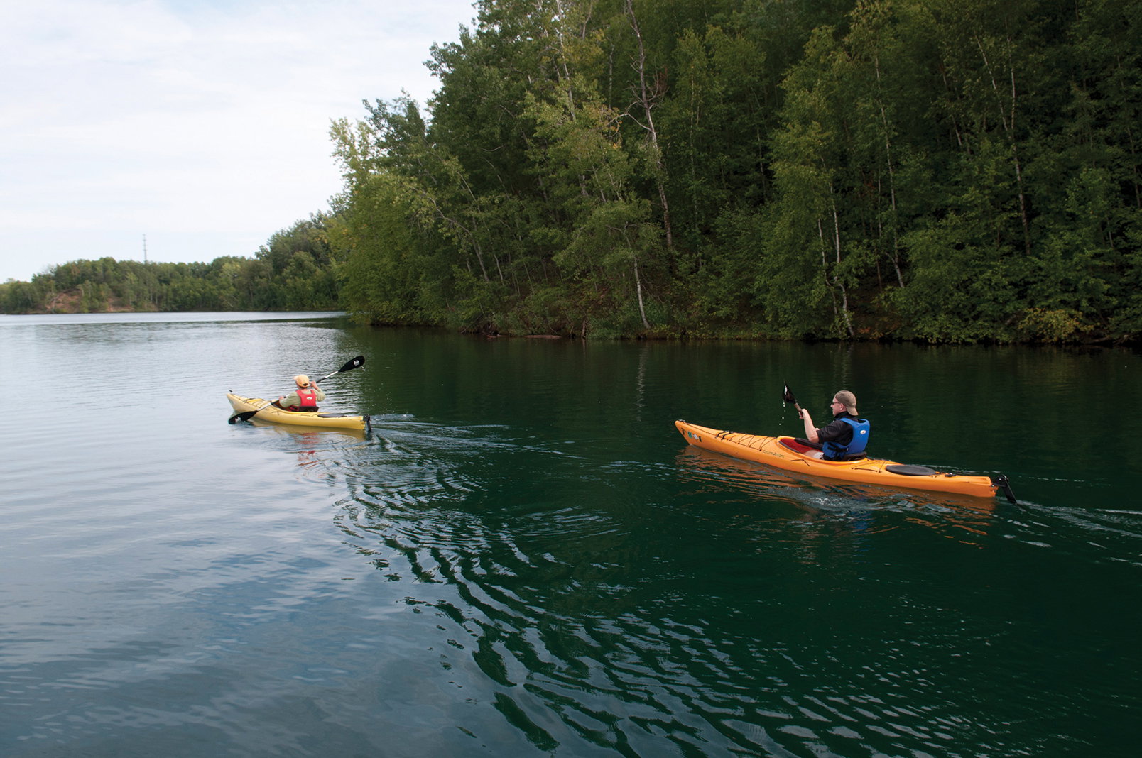 Kayaking on a mine pit lake in the Crosby area