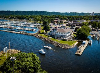 Visit Lake City aerial view of lighthouse and marina on the Mississippi River, in Lake City