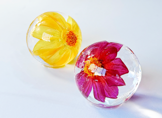 Make the Holidays Extra Special with Pure & Clear™ Minnesota Ice yellow and pink flowers in ice sphere cube